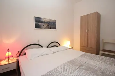 Letto o letti in una camera di Faustina 02