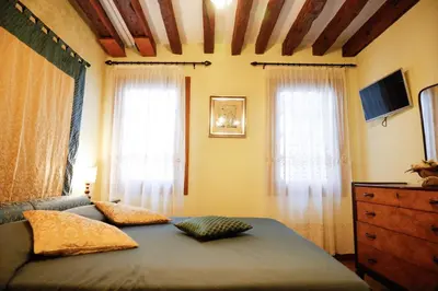 Letto o letti in una camera di Appartamento San Marco Frezzaria