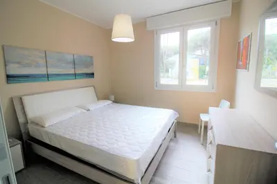 Letto o letti in una camera di Villa Marianna
