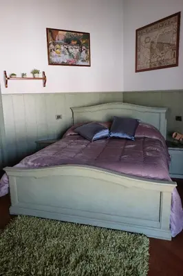 Letto o letti in una camera di B&B agli Ulivi