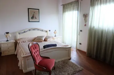 Letto o letti in una camera di B&B agli Ulivi