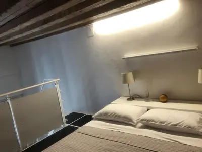 Letto o letti in una camera di Venetian Loft House
