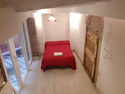 Letto o letti in una camera di the secret garden in the very heart of Venice