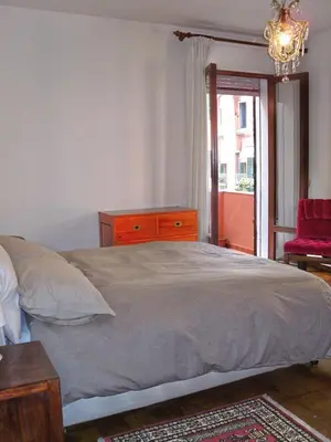 Letto o letti in una camera di Cà Dolce
