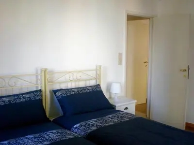 Letto o letti in una camera di Cà Dolce