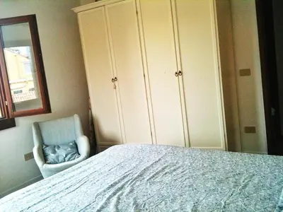 Letto o letti in una camera di Cà Dolce Attico