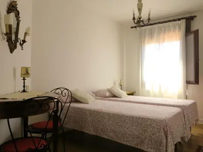 Letto o letti in una camera di Cà Dolce Attico