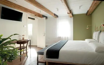 Letto o letti in una camera di Agriturismo Basegò