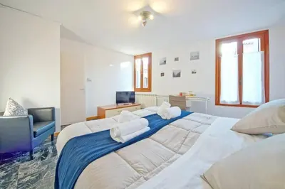Letto o letti in una camera di Venice 410 San Polo Roky wifi center city