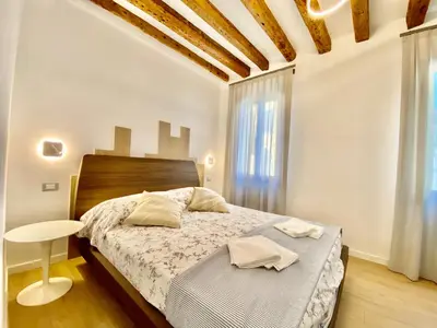 Letto o letti in una camera di Suite House 4343 apartments