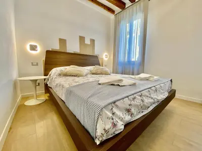 Letto o letti in una camera di Suite House 4343 apartments