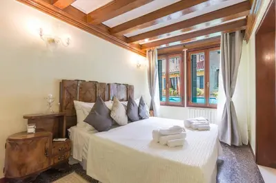 Letto o letti in una camera di Residence Suite a Venezia