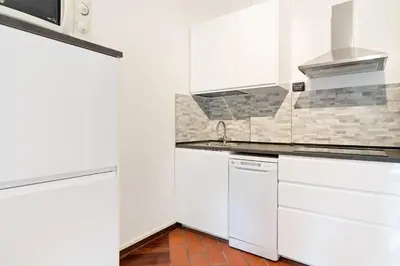 Cucina o angolo cottura di GuestHost - A pochi passi da Prato della Valle Apartment