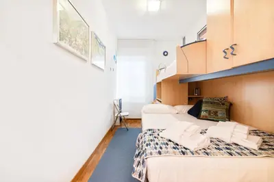 Letto o letti in una camera di GuestHost - Ospedale & Galleria Ognissanti Apartment