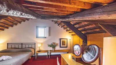 Letto o letti in una camera di Penthouse Accademia