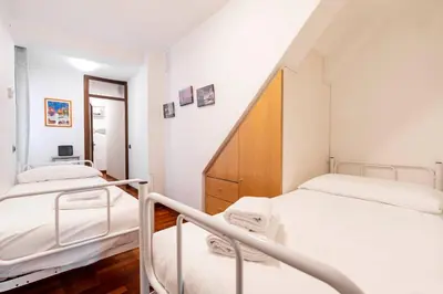 Letto o letti in una camera di Residenza Ca' Giacomo