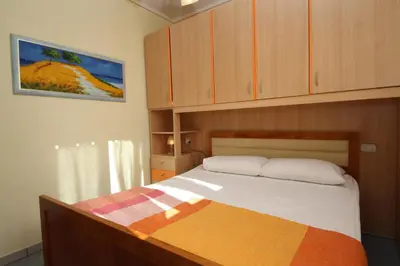 Letto o letti in una camera di Residence Sole e Mare appartamenti
