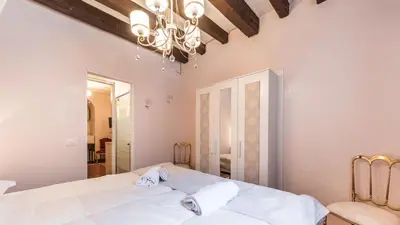 Letto o letti in una camera di Residenza La Salute