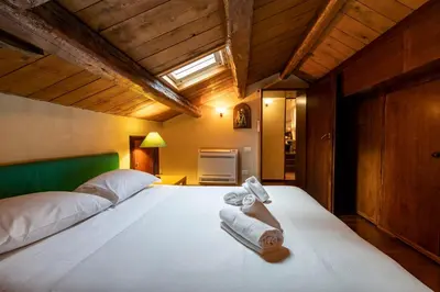 Letto o letti in una camera di Casa Lia