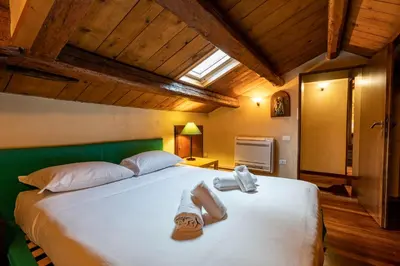 Letto o letti in una camera di Casa Lia