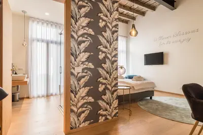 TV o dispositivi per l'intrattenimento presso Blooms Botanical Rooms