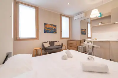 Letto o letti in una camera di Casa del Pittore Rialto