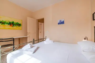 Letto o letti in una camera di Residenza dell'Arte