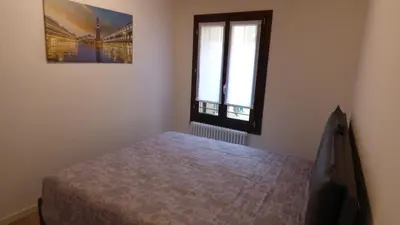 Letto o letti in una camera di CASA MODERNA A DUE PASSI DA RIALTO