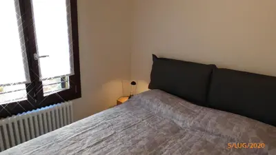 Letto o letti in una camera di CASA MODERNA A DUE PASSI DA RIALTO