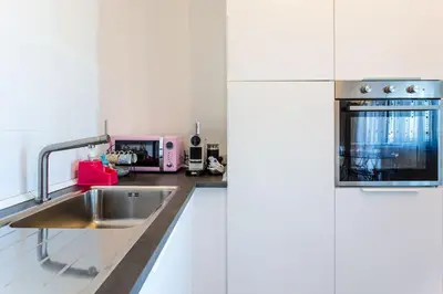 Cucina o angolo cottura di La Bella Vita - Maison Dina