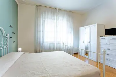 Letto o letti in una camera di La Bella Vita - Maison Dina