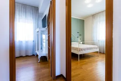Letto o letti in una camera di La Bella Vita - Maison Dina