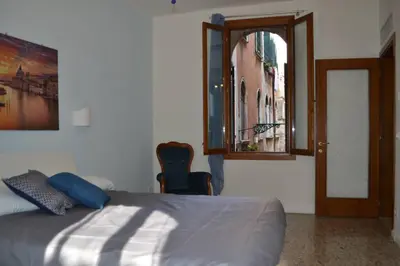 Letto o letti in una camera di Ca' Bacio della Luna