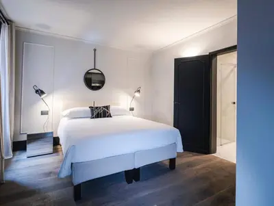 Letto o letti in una camera di LUXURY SANTO STEFANO
