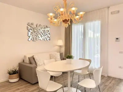 Area soggiorno di Appartamenti Wave Village 2 - Carraro Immobiliare - Family Apartments