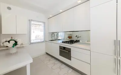 Cucina o angolo cottura di Dominique - Carraro Immobiliare - Family Apartments