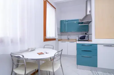 Cucina o angolo cottura di Veneziacentopercento Corderie Apartment