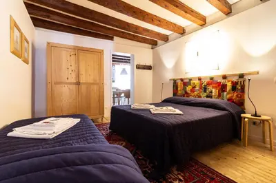 Letto o letti in una camera di Veneziacentopercento Campaniel Apartment