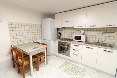 Cucina o angolo cottura di Veneziacentopercento Picenin Apartment