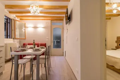 Area soggiorno di Veneziacentopercento Arco Apartment