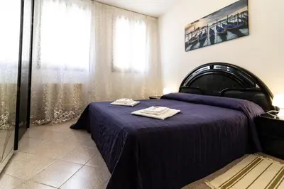 Letto o letti in una camera di Veneziacentopercento Ruga Apartment