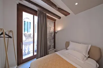 Letto o letti in una camera di HAMMAM Venice