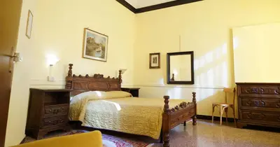 Letto o letti in una camera di B&B Corte Campana