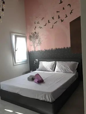 Letto o letti in una camera di Altana Deluxe Apart