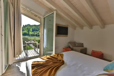 Letto o letti in una camera di Casa Massaro Todeschini