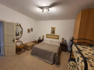 Letto o letti in una camera di Residenza oleandro rosa