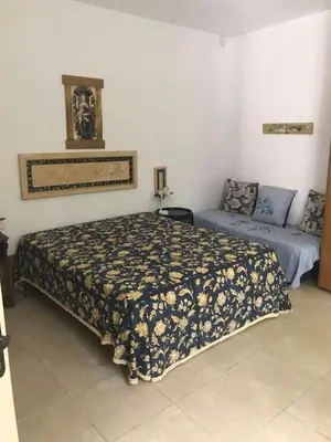 Letto o letti in una camera di Residenza oleandro rosa