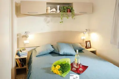 Letto o letti in una camera di Casa mobile - Union Lido