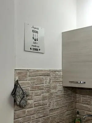 Certificato, attestato, insegna o altro documento esposto da AT HOME Mogliano come a casa ma in vacanza