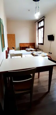 Letto o letti in una camera di Casa Santa Caterina e Sant Antonio